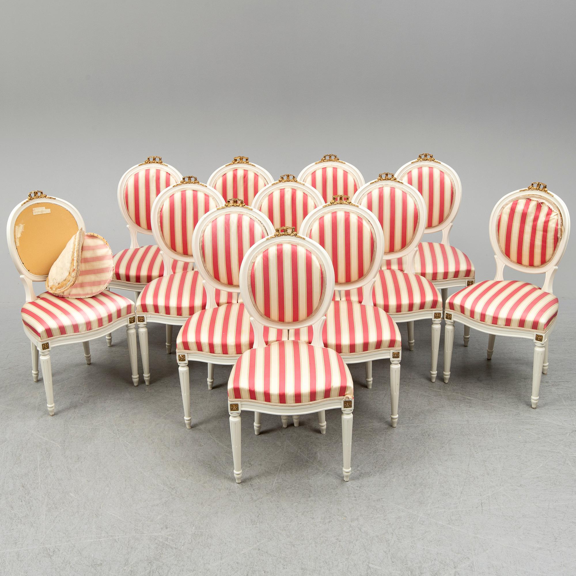 A set of 12 Swedish chairs, gustavian style, for NK (Nordiska Kompaniet), mid 20th century.
