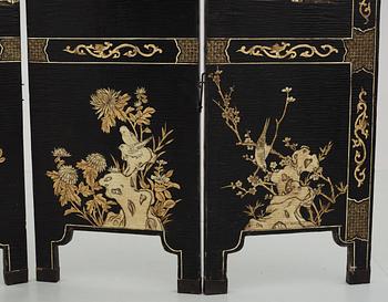 A six panel lacquer screen, Qing dynasty (1644-1911).
