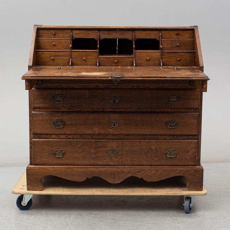 A mid 18th century oak secretaire.