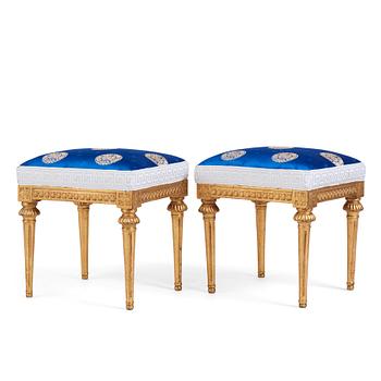 81. A pair of late Gustavian giltwood stools, late 18th century.