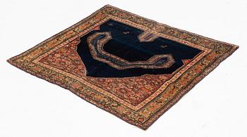 A Senneh saddle cover, North West Persia, ca 80 ,5 x 92,5  cm.