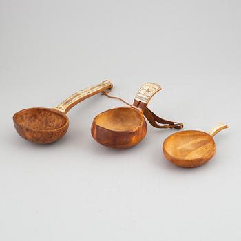 Three Sami birch and reindeer horn cups, signed, one by Olof Tomas Svonni.