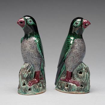 A pair of Chinese figures of parrots, late Qing dynasty.