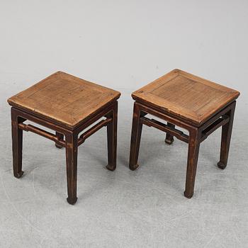 A pair of hardwood tables, 20th century.