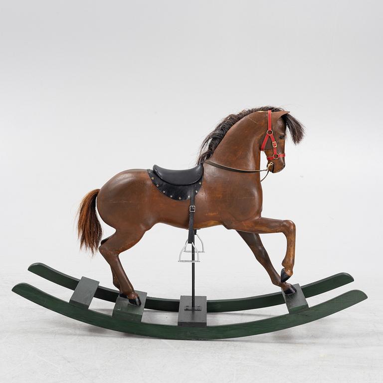 An early 20th century rocking horse.