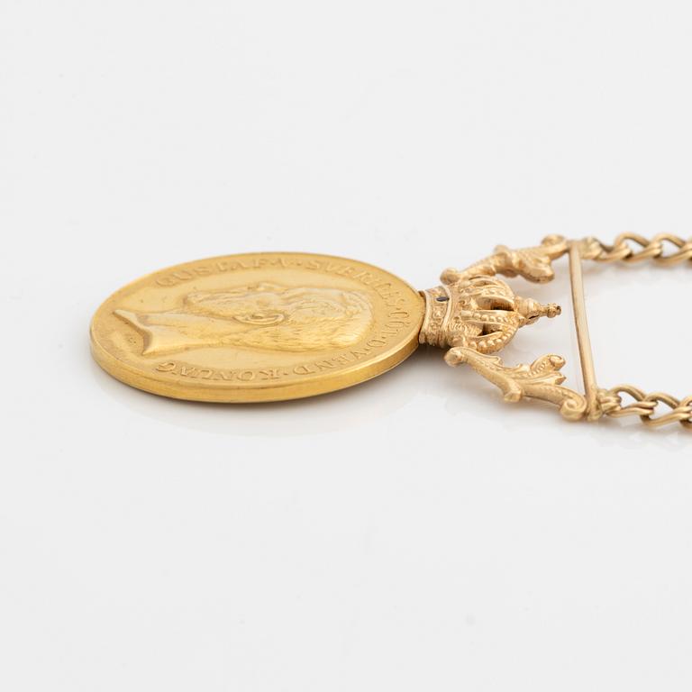 Medal, for diligence and integrity, gold, with a later chain in 18K gold.