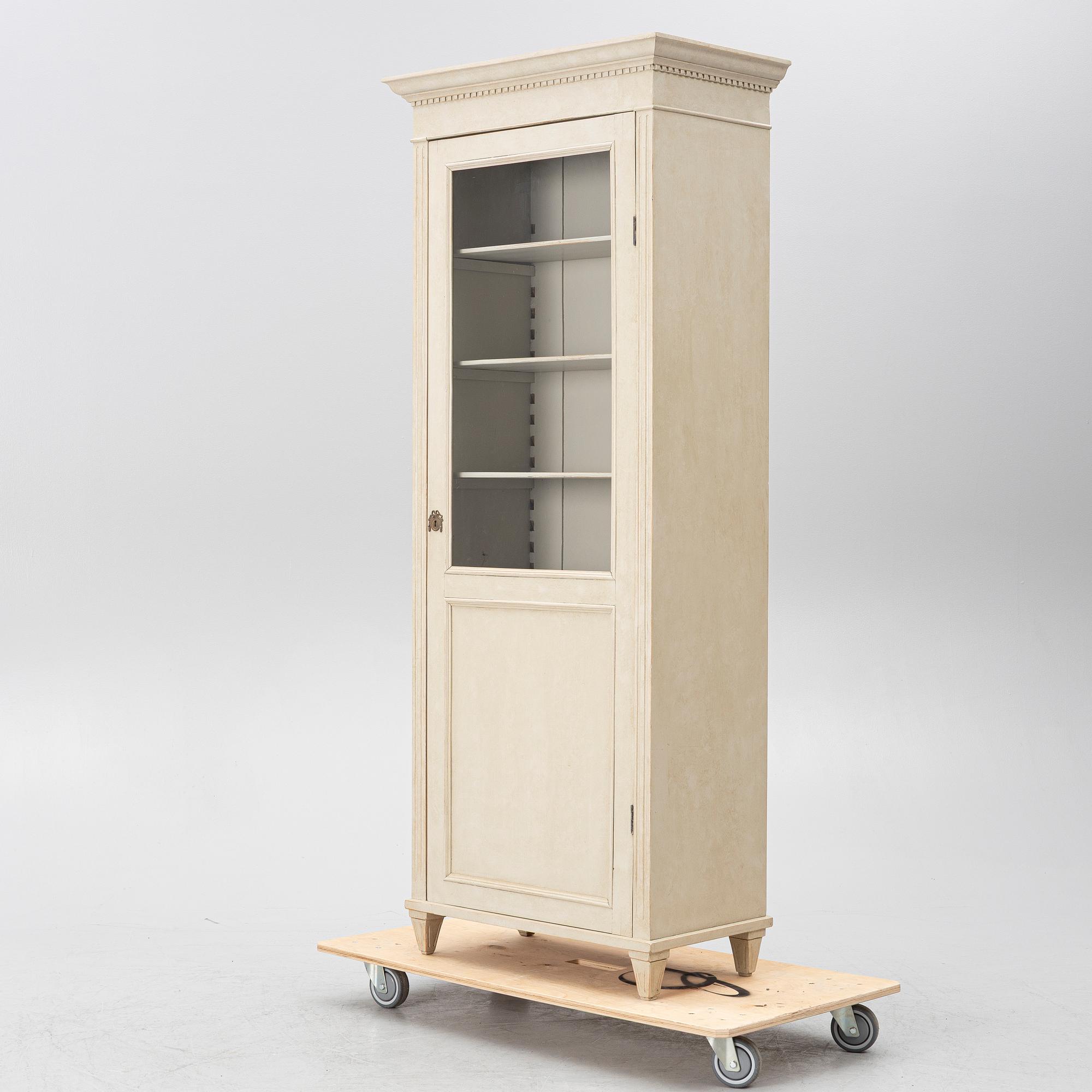 Display cabinet, early 20th century.