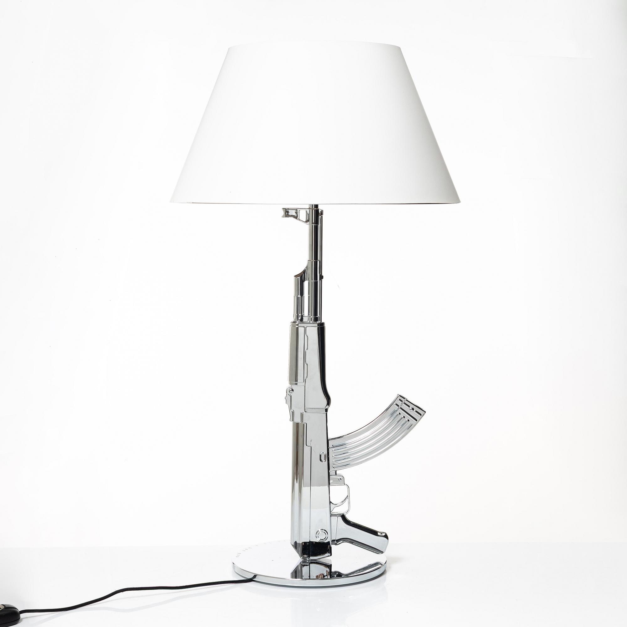 Philippe Starck, a table lamp, 'Table Gun Lamp', FLOS, Italy.