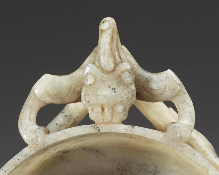A carved nephrite ceremonial wine cup, late Qing dynasty.
