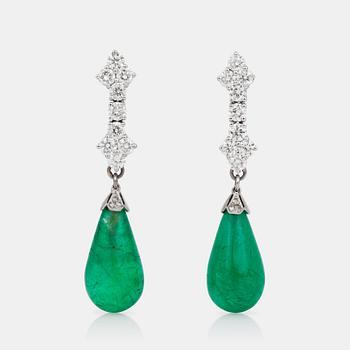 694. A pair of earrings with drop-shaped emeralds and brilliant-cut diamonds.