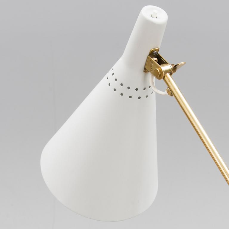 AN ADJUSTABLE FLOOR LAMP, K10-11. Manufactured by Idman Oy. Designed 1958.