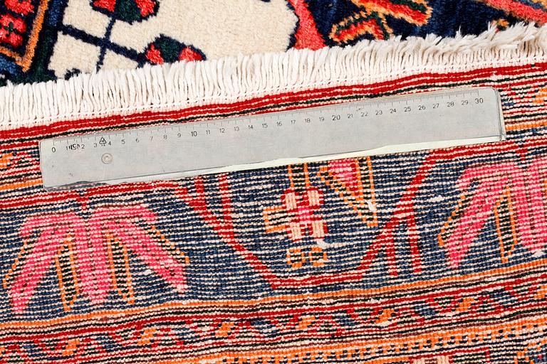 A north west persian rug, 218 x 159 cm.