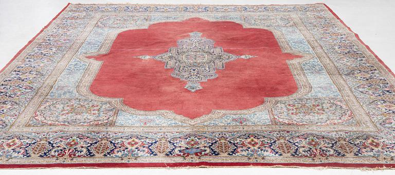 A Kerman carpet, c. 388 x 299 cm.