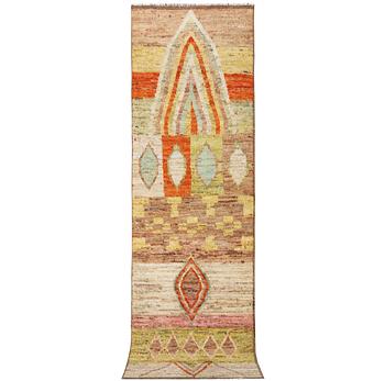 A Moroccan runner carpet, c. 304 x 84 cm.