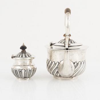 A silver coffee pot and a sugarbowl, including John Aldwinckle & Thomas Slater, London, England, 1844.