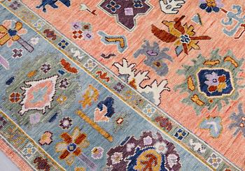 A carpet,  Oriental, ca 305 x 242 cm.