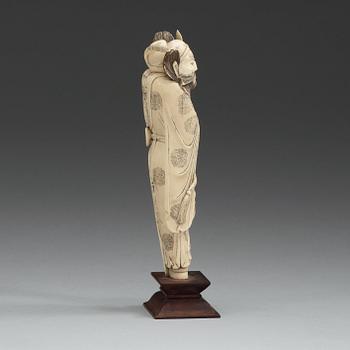 An carved ivory sculpture of a guardsman, China, early 20th Century.