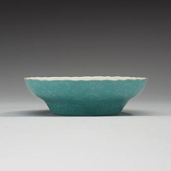 A turquoise slip decorated bowl, Qing dynasty, with Daoguangs seal mark in red and period (1821-50).