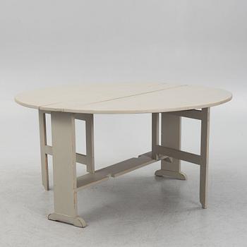 A painted gate-leg table, 19th Century.