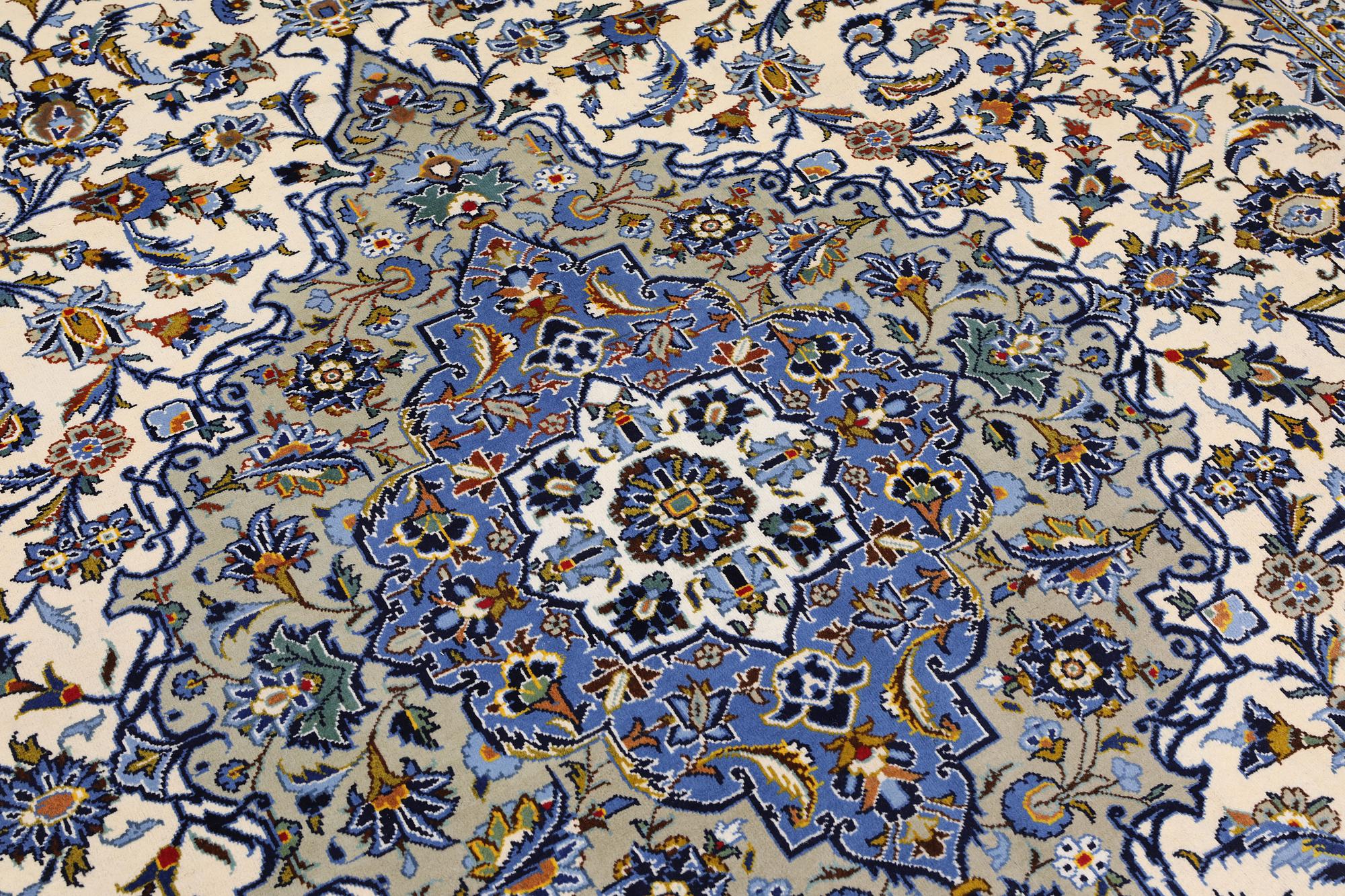 A Keshan carpet, signed, 386 x 281 cm.