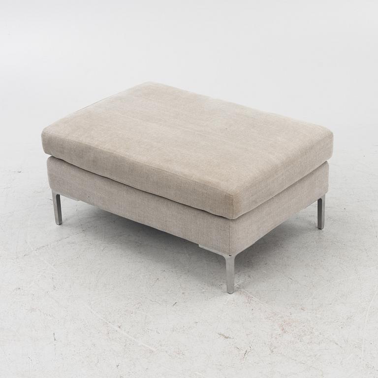 A 'Curve' sofa with a foot stool, Ire, 21st Century.