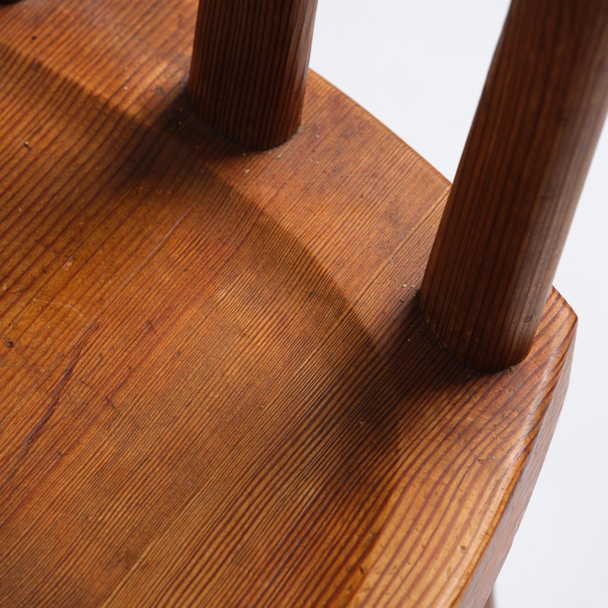 Axel Einar Hjorth, a set of six stained pine "Utö" chairs, Nordiska Kompaniet, Sweden, 1930s.