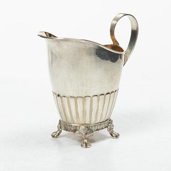 A Swedish silver coffee pot, cream jug and sugar box, Gustavian style, mark of AG Dufva, Stockholm 1911-1912.