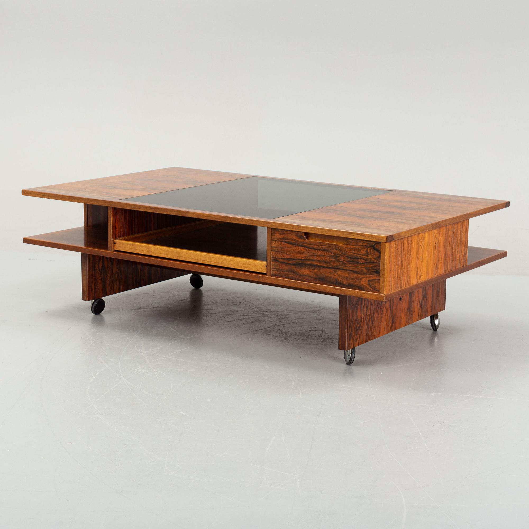 Torbjørn Afdal, a rosewodd veneered coffee table, Haug Snekkeri A/S, Bruksbo, Norway, 1960's/70's.