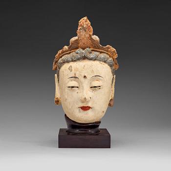 A stucco head of a Bodhisattva, Ming dynasty (1368-1644).