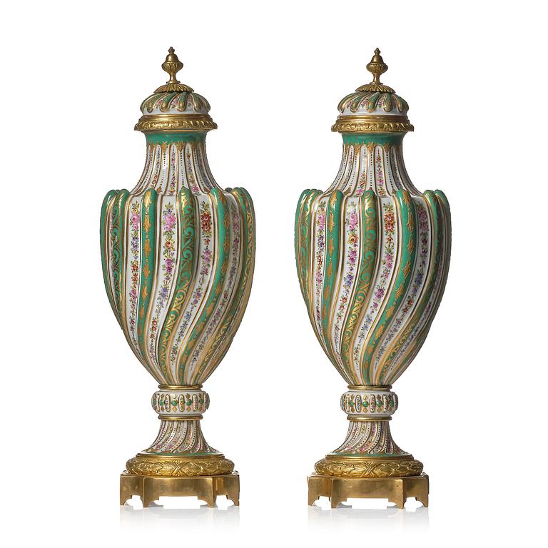A pair of French 'Sèvres' porcelain urns, 1890s.