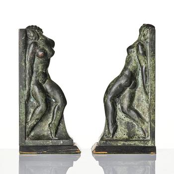 Axel Gute, a pair of Swedish Grace patinated bronze bookends, 1920s.