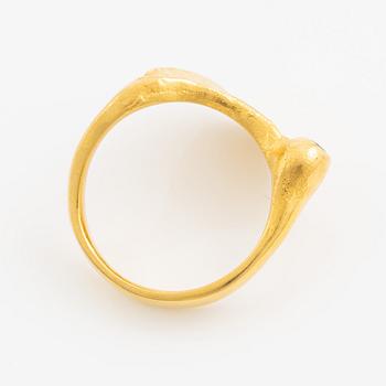 Ring, 18K guld med en rund briljantslipad diamant.