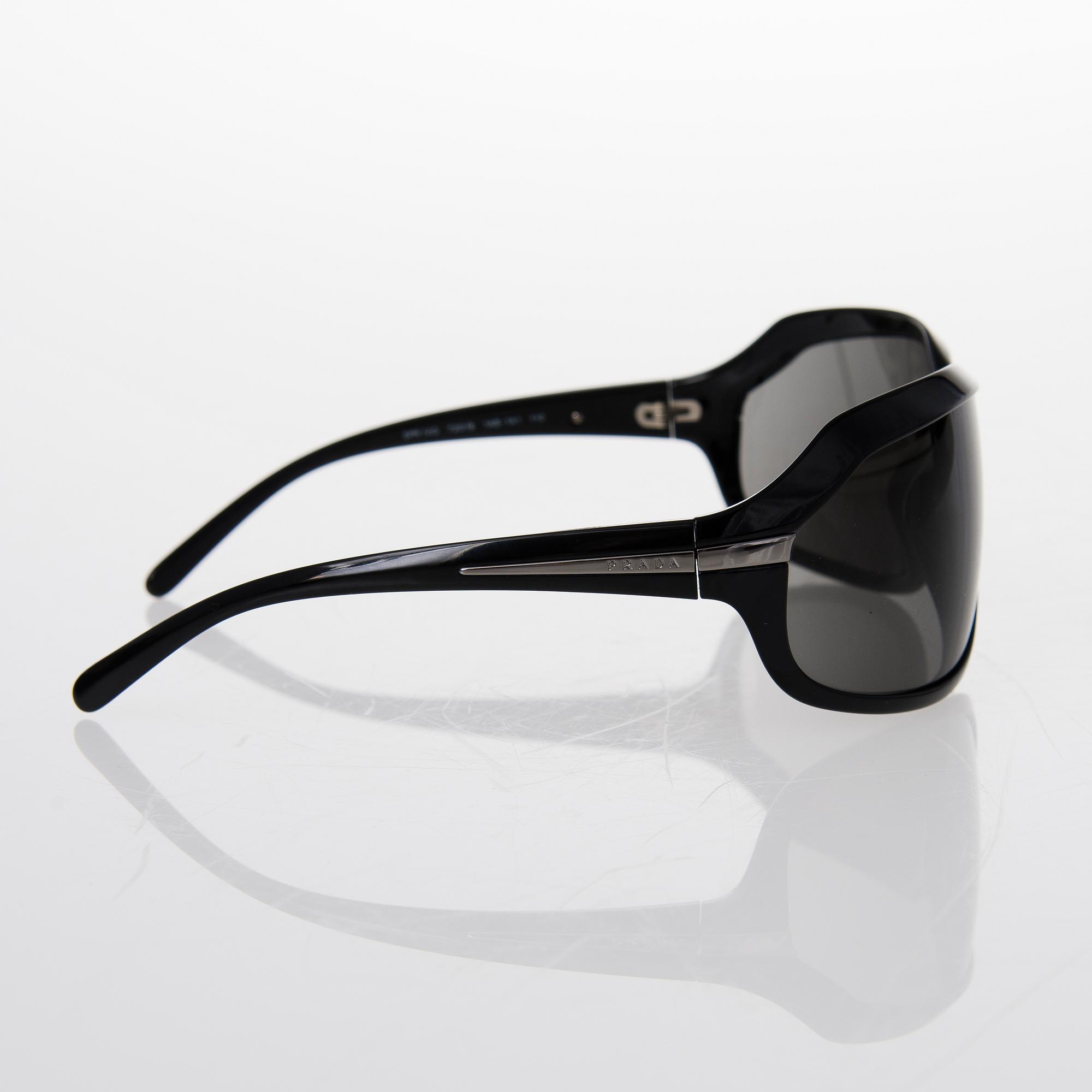 Prada and Chanel Sunglasses.