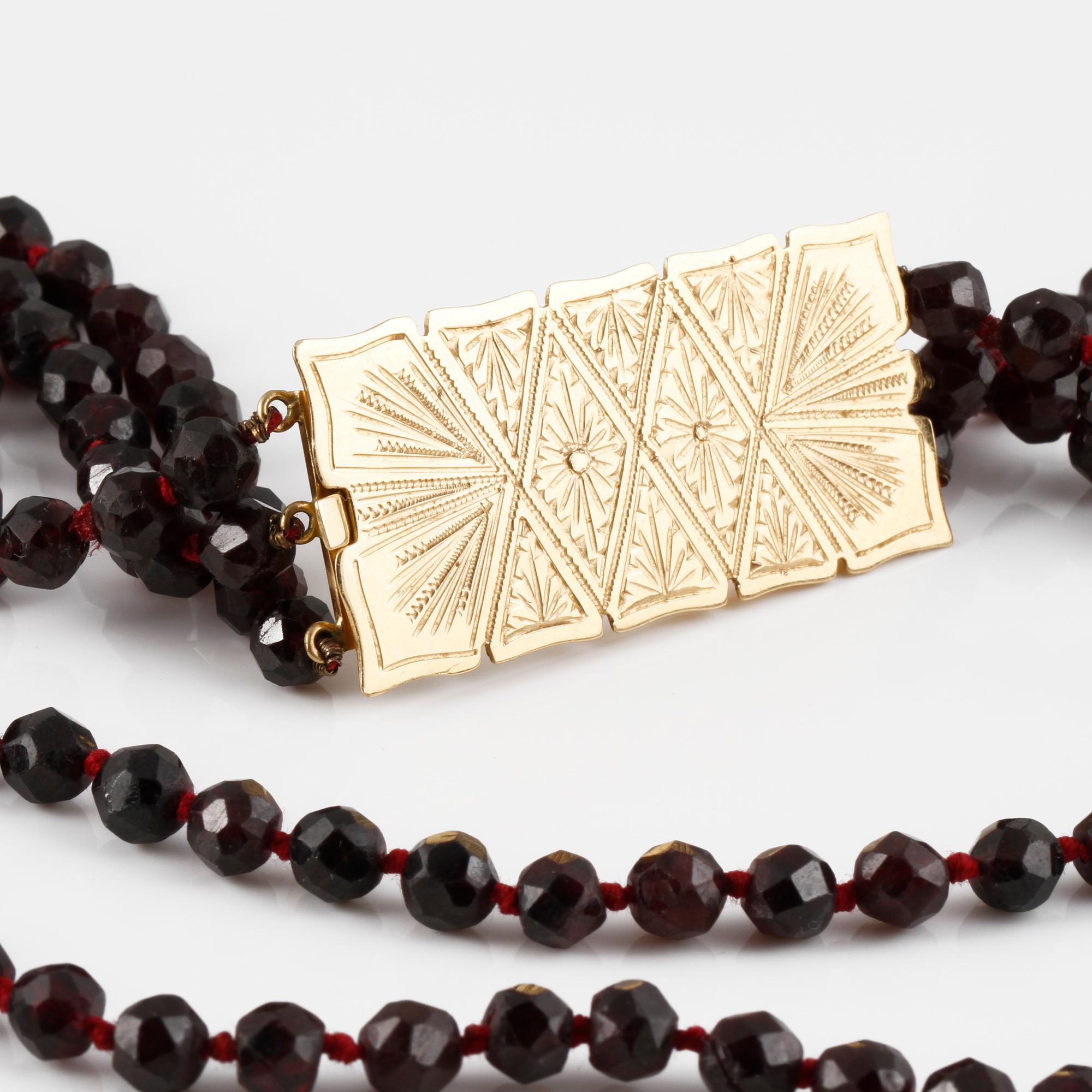 COLLIER, 18K guld med fasettslipade granater, Piacenza, Italien.