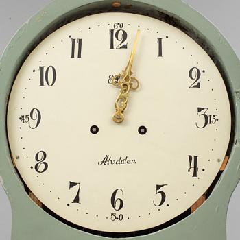 A combined clock and chest of drawers from late 19th  century.