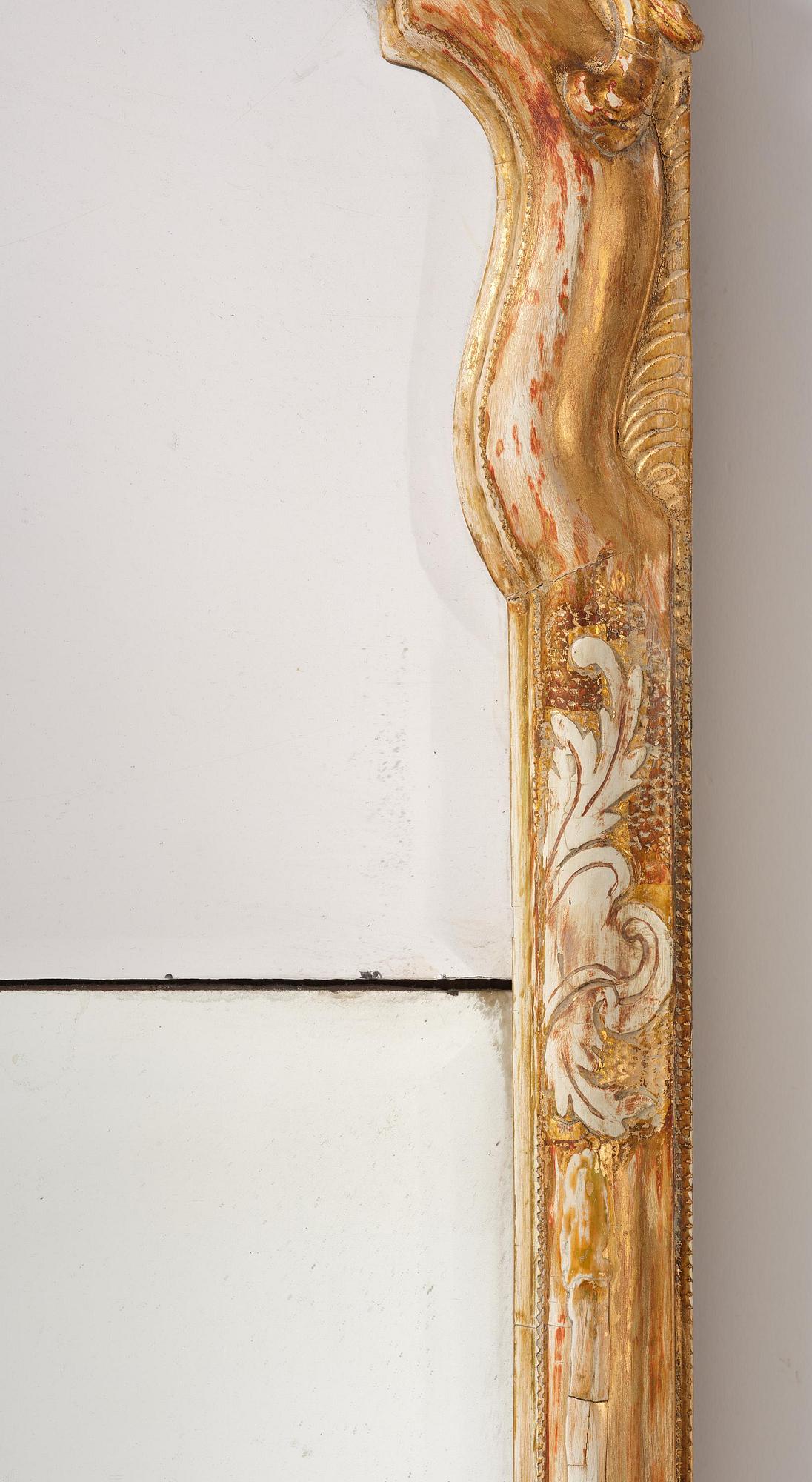 A Swedish Rococco mirror, late 18th century.