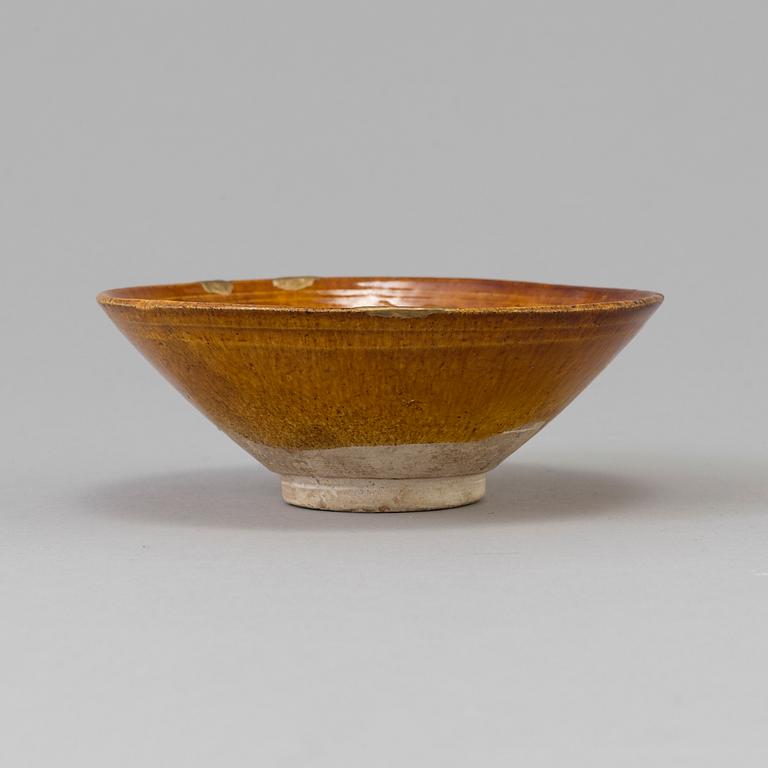 A Chinese yellow-glazed ceramic bowl, Liao dynasty (916-1225).