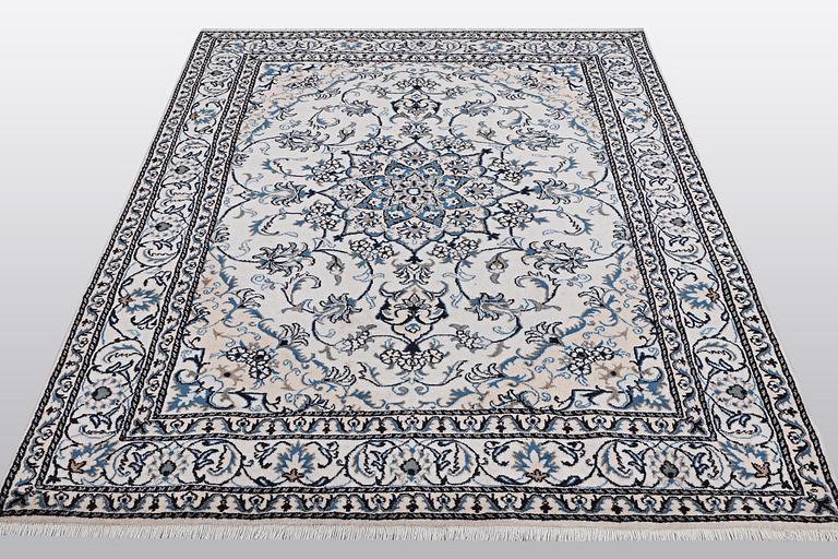A rug, Nain, part silk, so called 9 LAA, ca 233 x 164 cm.