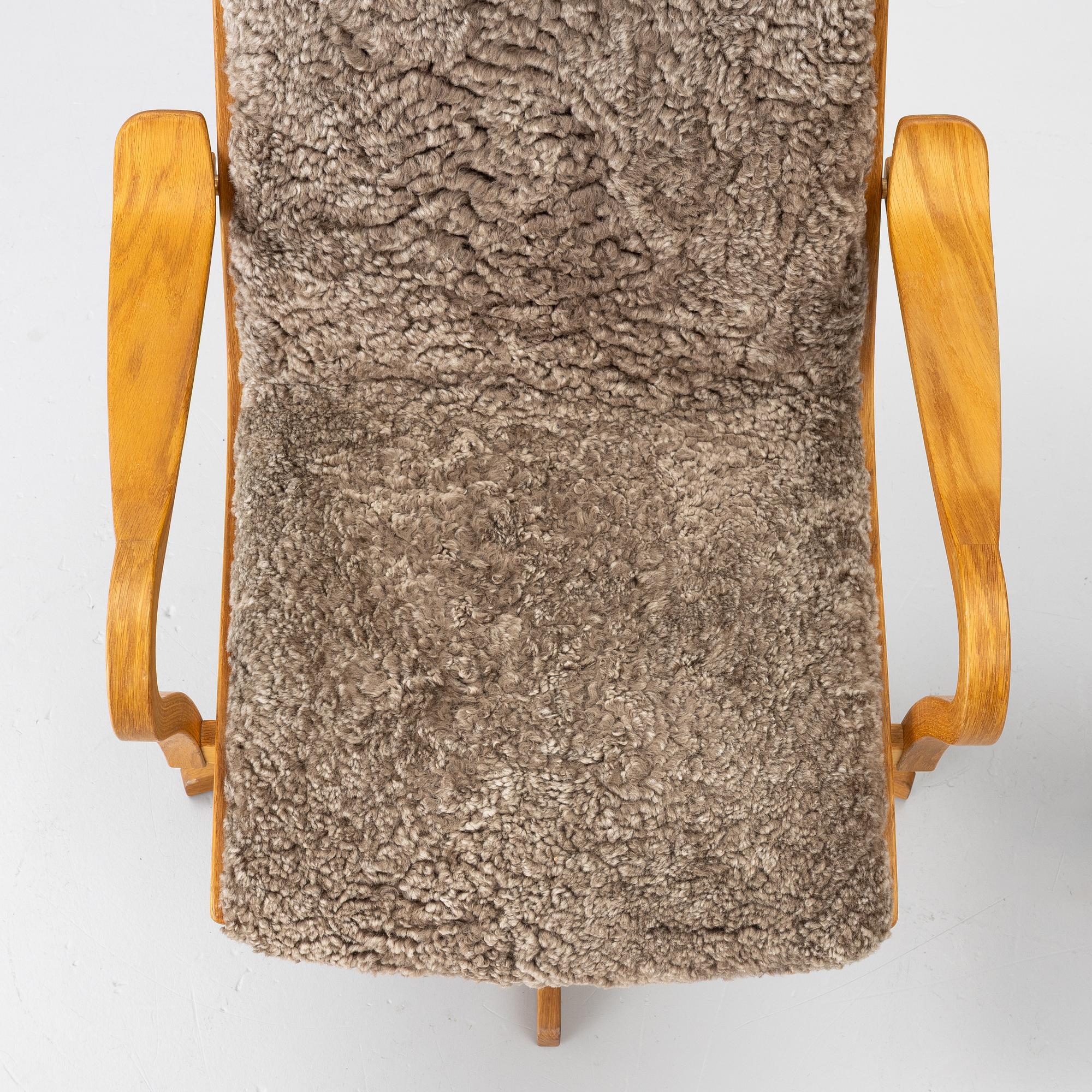 Armchair with footstool. 'Chic', Bröderna Andersson, contemporary.