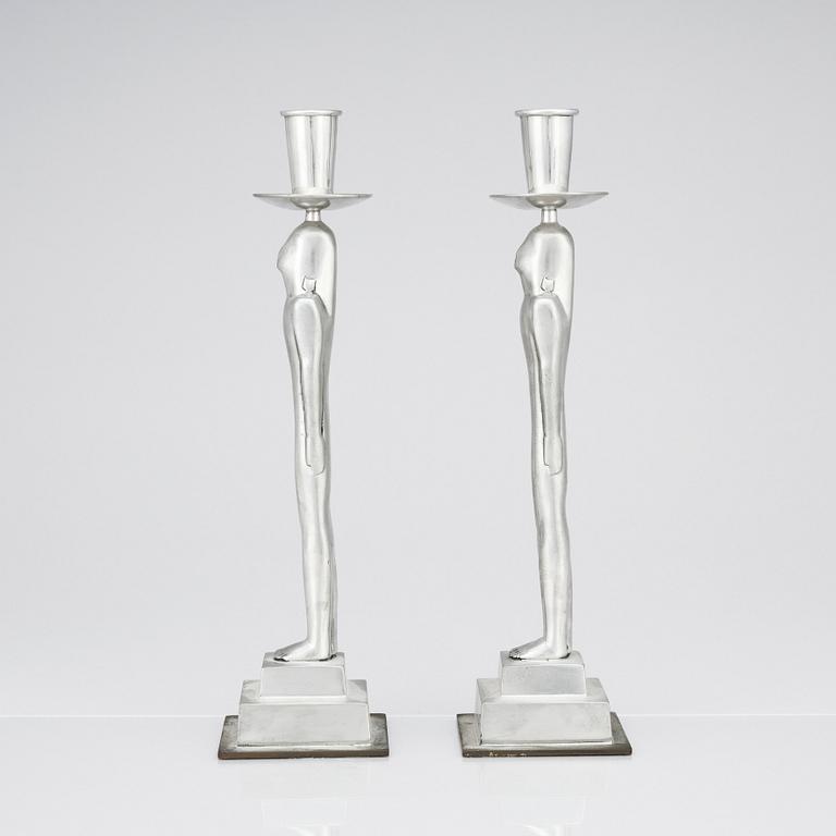 Edvin Öhrström, a pair of pewter and brass 'Egyptian' candlesticks, Svenskt Tenn, Sweden 1984.