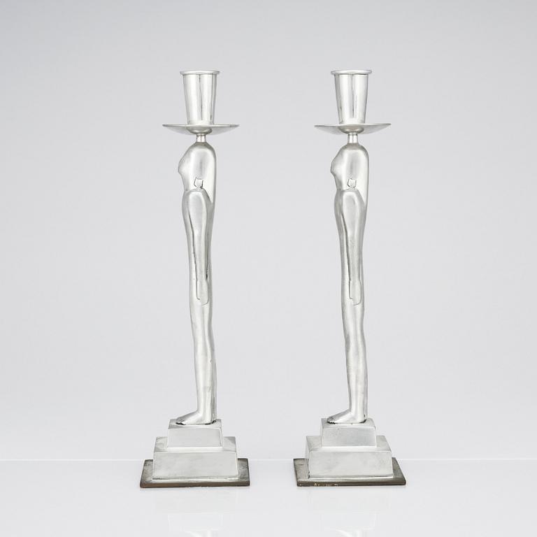 Edvin Öhrström, a pair of pewter and brass 'Egyptian' candlesticks, Svenskt Tenn, Sweden 1984.