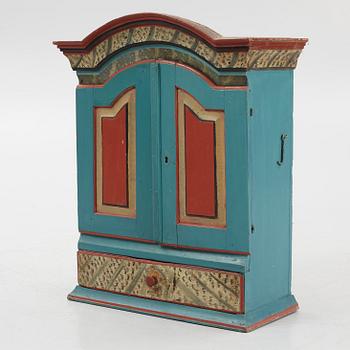A Swedish provincial wall cabinet, possibly from Dalarna, early 19th century.
