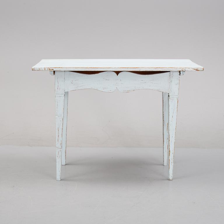 A painted table, 19th Century.