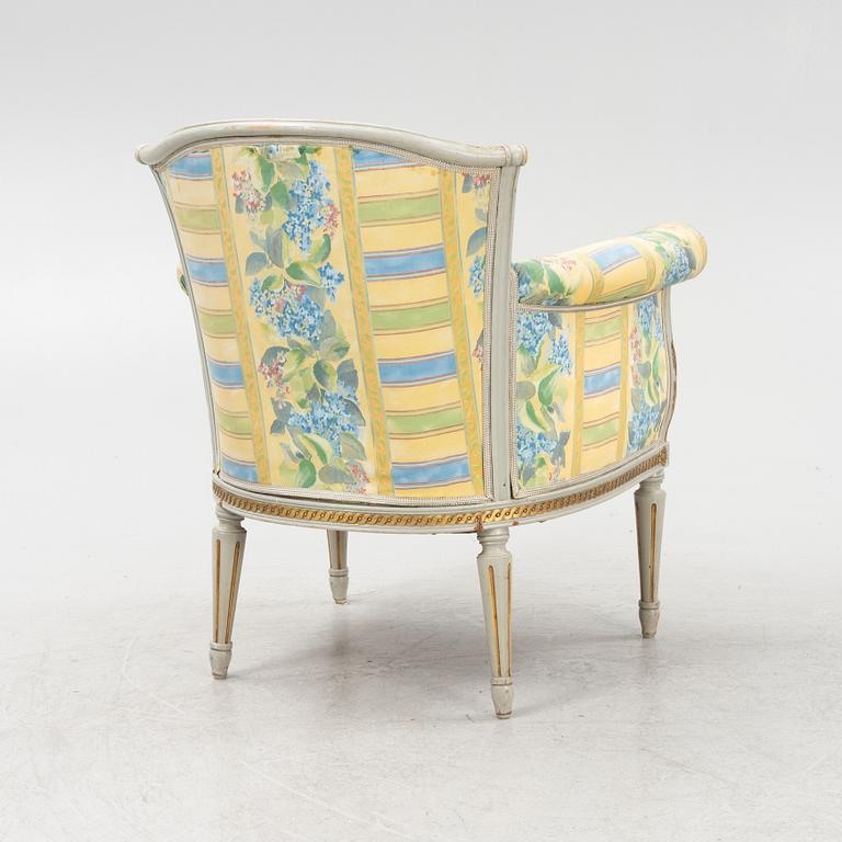 A Louis XVI style armchair, 20th Century.
