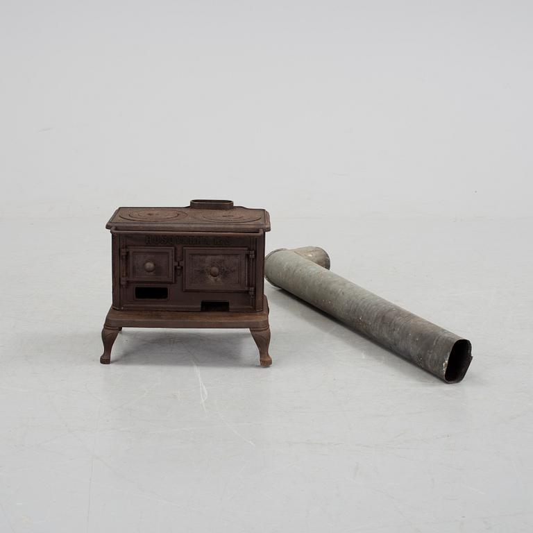 A cast iron toy stove, Husqvarna, Sweden, early 20th century.