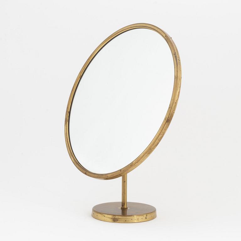 A Swedish Modern brass table mirror, 1940's/50's.