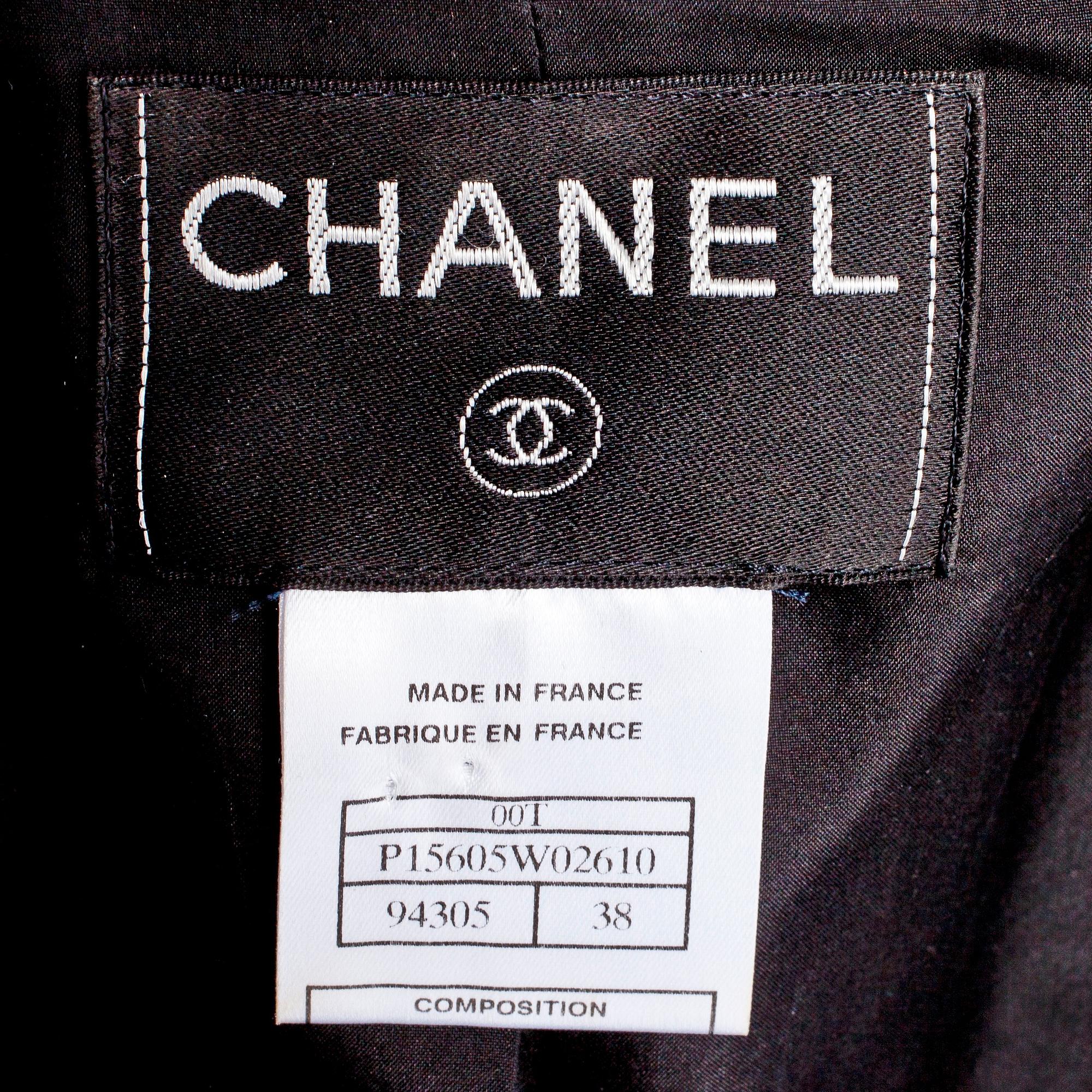 CHANEL, a two-piece suit consisting of jacket and skirt.