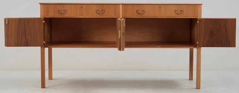 A Josef Frank walnut sideboard with a burrwood top, Svenskt Tenn.