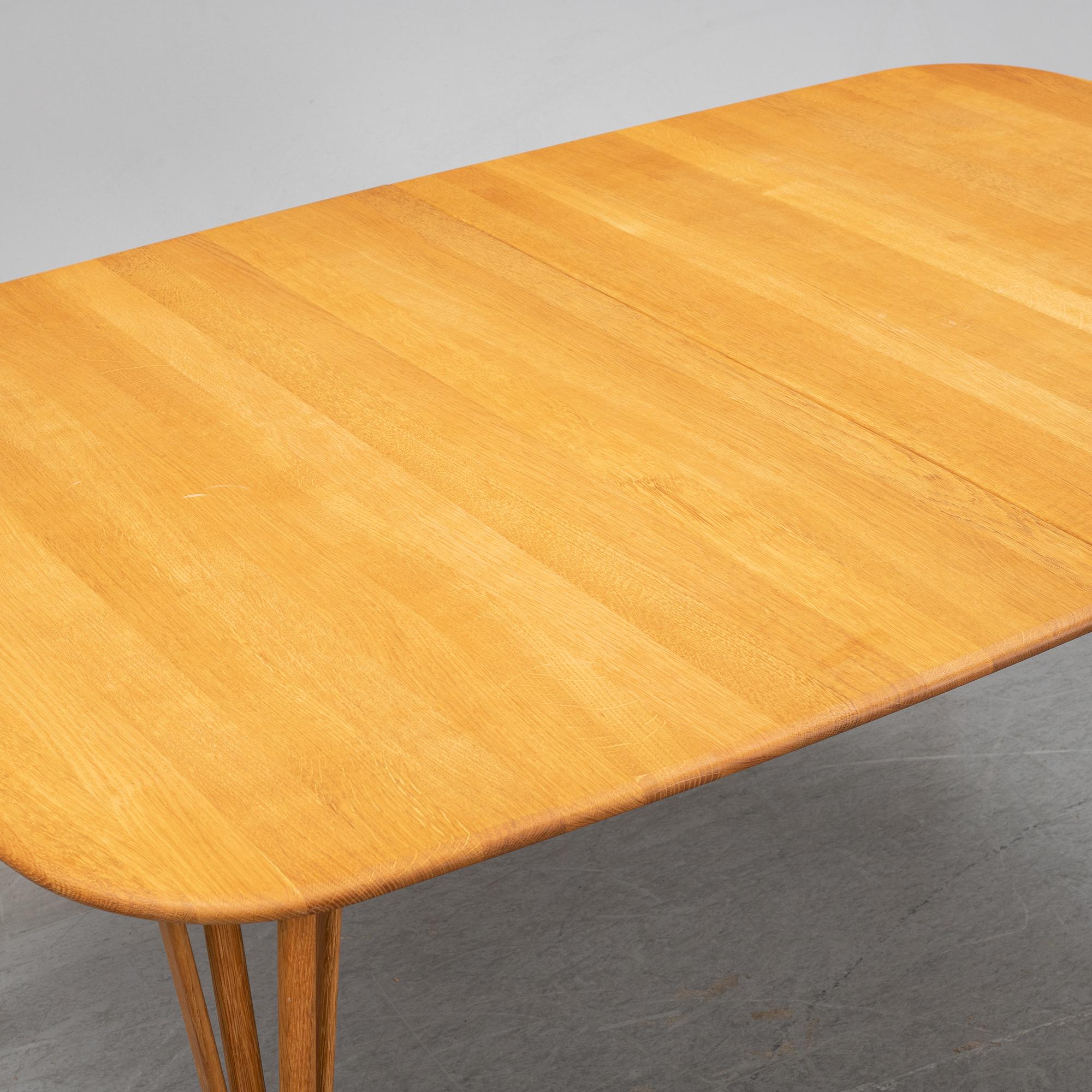 An oak 'Timeless' dining table, Haslev, Denmark.