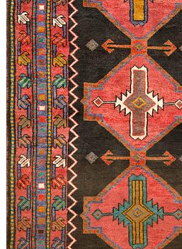 A Tabriz rug, approx. 448 x 114 cm.